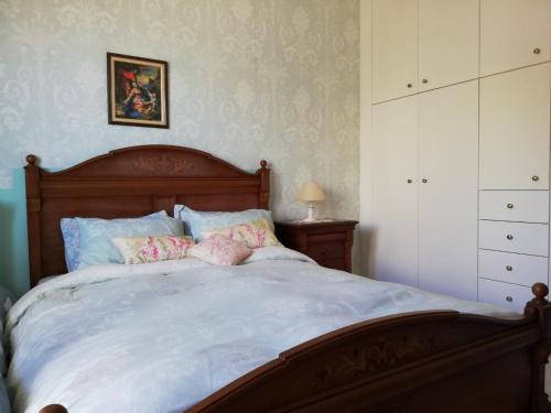 Säng eller sängar i ett rum på Villa Maneti