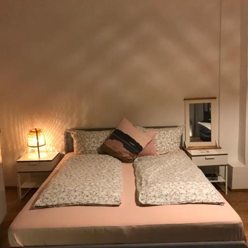 Postel nebo postele na pokoji v ubytování DOM APARTS