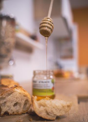 a peanut butter being poured into a piece of bread at Hotel - Restaurant Les 3 Piliers in Le Boupère
