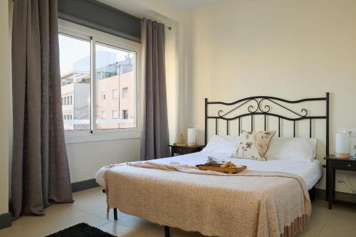 Säng eller sängar i ett rum på Casa Cosi - Terrace 2