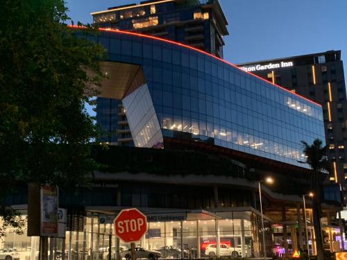 a building with a stop sign in front of it at Umhlanga Arch 703 Sea View self-catering in Durban