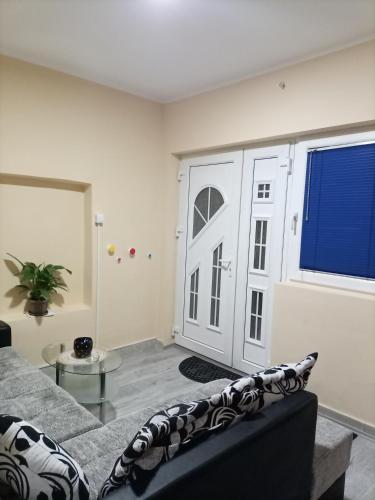 Ένα ή περισσότερα κρεβάτια σε δωμάτιο στο Apartman Kika 1