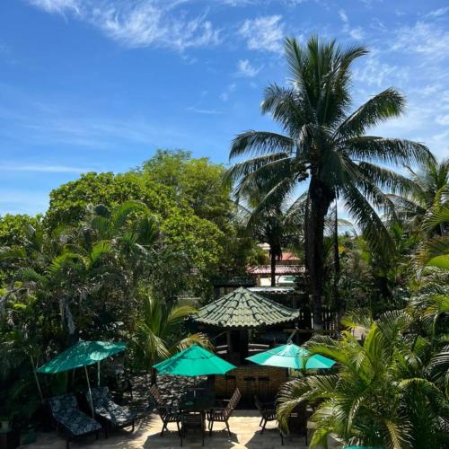 Taman di luar Pousada Recanto Verde e Mar