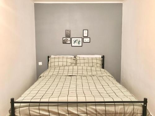 Ένα ή περισσότερα κρεβάτια σε δωμάτιο στο Jungle Cosy Appartement