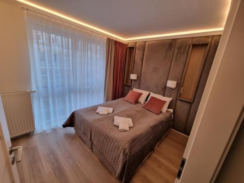 En eller flere senger på et rom på Apartamenty 21 Śląska