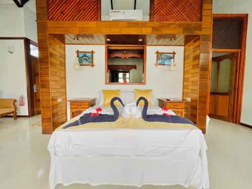 
Ein Bett oder Betten in einem Zimmer der Unterkunft Villa Chez Batista
