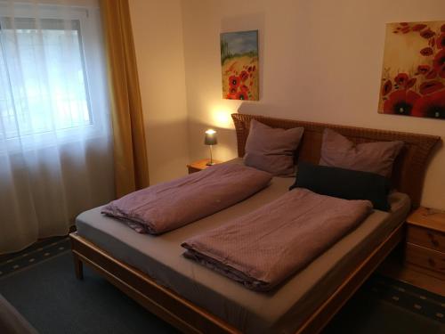 Postel nebo postele na pokoji v ubytování Vor den Toren Bambergs - Einfamilienhaus mit Garten!