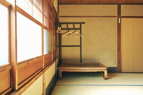 Katil atau katil-katil dalam bilik di Gojo Guest House