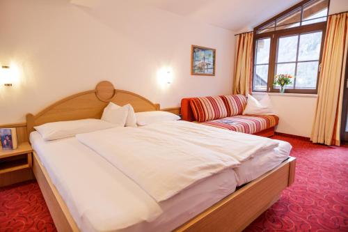 Una cama o camas en una habitación de Feriendorf Ponyhof