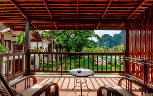 A balcony or terrace at Riverside Boutique Resort, Vang Vieng