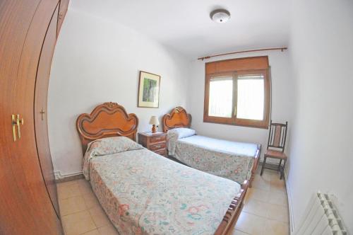 A bed or beds in a room at 1Mass01