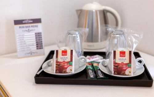 Set per la preparazione di tè e caffè presso Hotel Boutique Libris