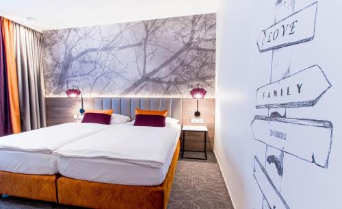 מיטה או מיטות בחדר ב-Hotel Boehler