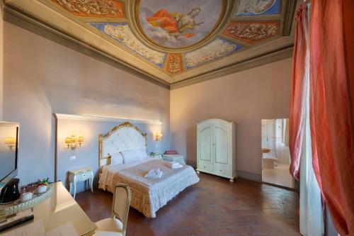 Postel nebo postele na pokoji v ubytování B&B I Quattro Poeti