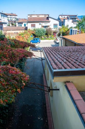 an overhead view of a street with a building at Hotel Melecchi in Lucca