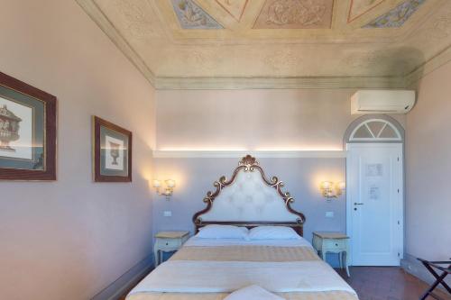 Postel nebo postele na pokoji v ubytování B&B I Quattro Poeti