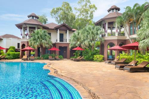 an image of a resort with a swimming pool at InterContinental Pattaya Resort by IHG in Pattaya South
