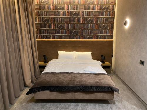 Кровать или кровати в номере Kuprin Hotel