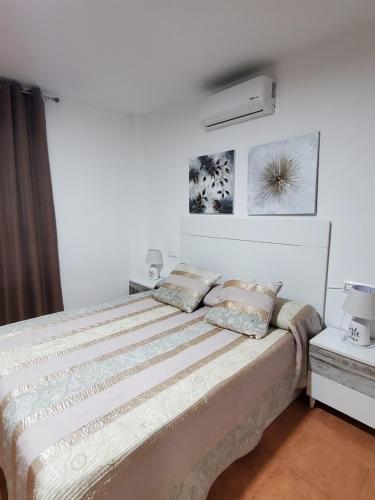 Posteľ alebo postele v izbe v ubytovaní DUPLEX ESPECTACULAR en PRIMERA LÍNEA NATURISTA!