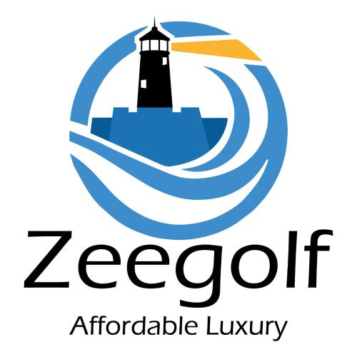 a lighthouse in the water with a wave at Zee Golf Affordable Luxury in Galle
