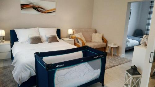 Posteľ alebo postele v izbe v ubytovaní Apartamenty gościnne na szlaku