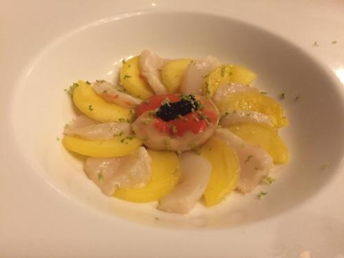 a white bowl of food with shrimp and squash at Domaine du Manoir in Les Avenières