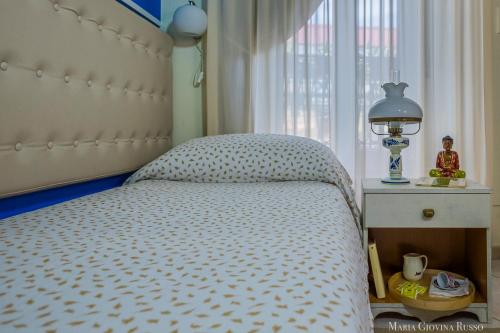 Katil atau katil-katil dalam bilik di Casa in Centro Foggia