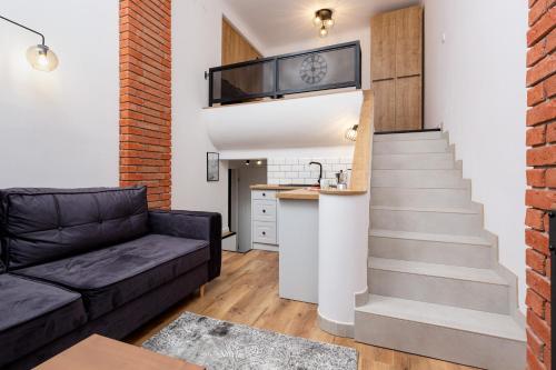 Kuchyň nebo kuchyňský kout v ubytování City Center Mezzanine Studio Chmielna by Noclegi Renters
