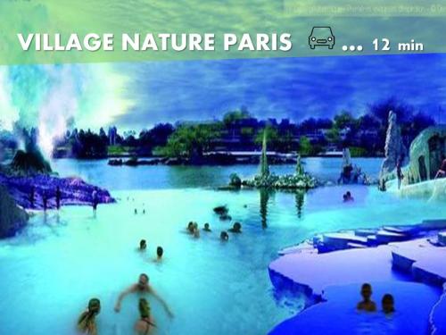 a group of people in the water at a water park at Appartement de charme DISNEYLAND PARIS - Nidouest in Chanteloup-en-Brie