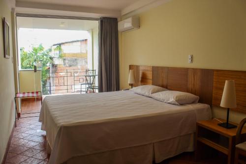 Cama o camas de una habitación en Hotel Cruz do Pascoal