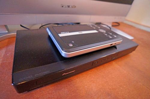 a cell phone is sitting on top of a laptop at Mujinzo in Yufuin