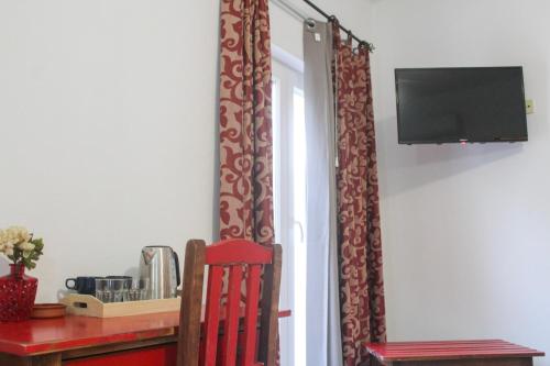 Μια τηλεόραση ή/και κέντρο ψυχαγωγίας στο The Central Guesthouse