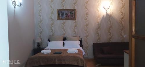 Postel nebo postele na pokoji v ubytování Hotel ,,Tengo,,