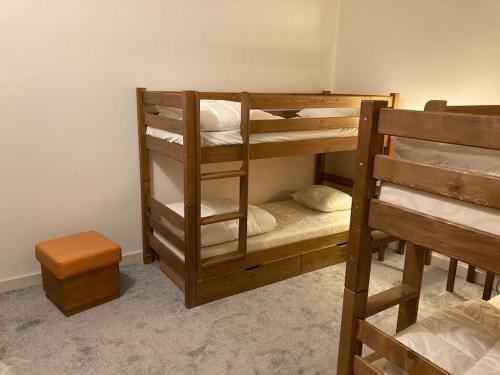 a group of bunk beds in a room at Guzet Neige coeur station in Ustou