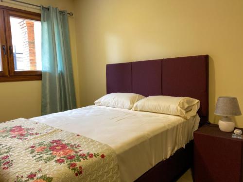 Postelja oz. postelje v sobi nastanitve Aparthotel Los Laureles