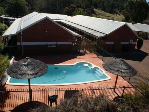 A view of the pool at Nelsons of Bridgetown or nearby