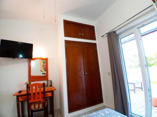 Μια τηλεόραση ή/και κέντρο ψυχαγωγίας στο The Central Guesthouse