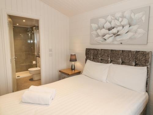 Säng eller sängar i ett rum på Lodge 4 - Glendoig