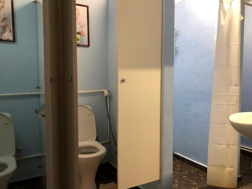 a bathroom with a toilet and a sink at ApartHotel in Alaverdi in Alaverdi