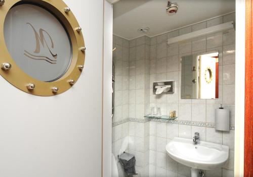 Koupelna v ubytování Hotell City