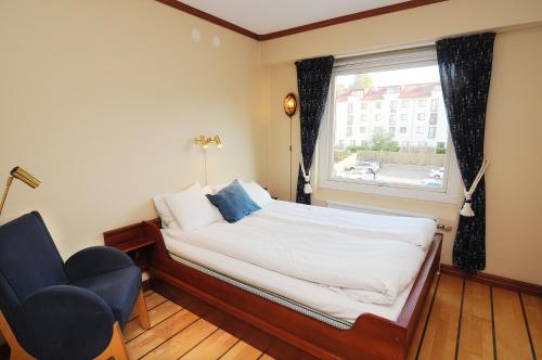 Postel nebo postele na pokoji v ubytování Hotell City
