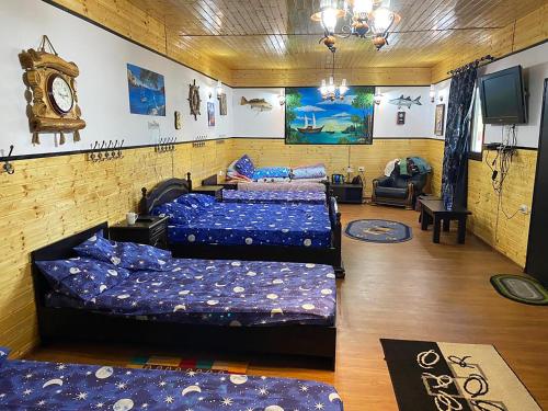 Un televizor și/sau centru de divertisment la Casa La Angela