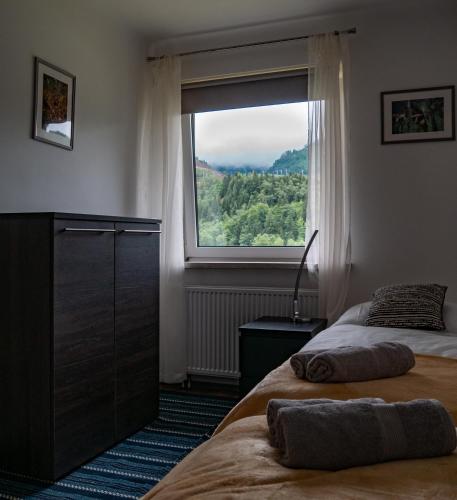 Katil atau katil-katil dalam bilik di ERZHAUS Apartments