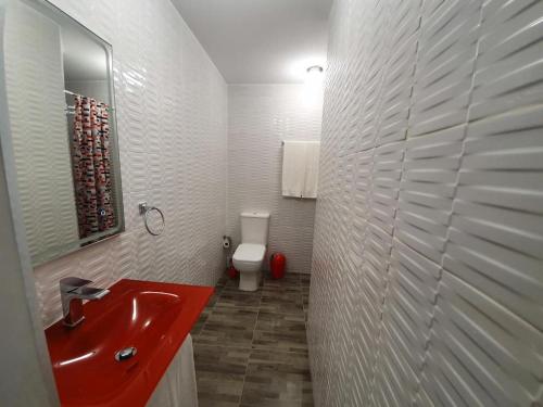 Kylpyhuone majoituspaikassa Apartamentos New York