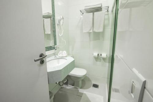 Um banheiro em Apart Hotel Porto Kanoas