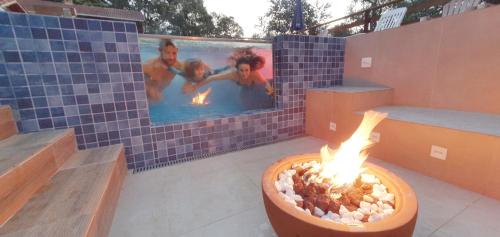 Φωτογραφία από το άλμπουμ του Hortensias Pousada Boutique - Piscina Aquecida 37 Graus e Fire Pit a Gas - Aceita PET σε Monte Verde