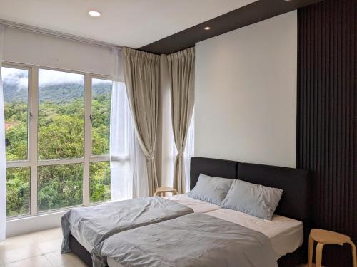 Vuode tai vuoteita majoituspaikassa Santubong Suites B Just Like Home Damai
