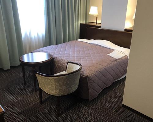 Ліжко або ліжка в номері アーバンホテル二本松