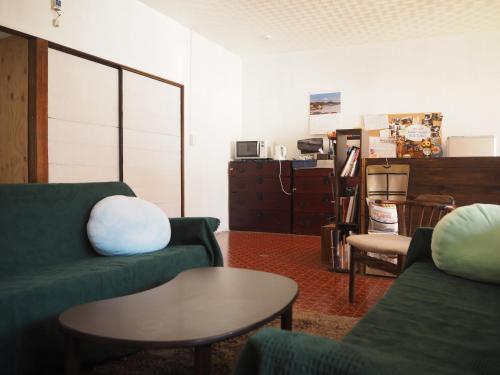 Posezení v ubytování Guest House SUETUGU