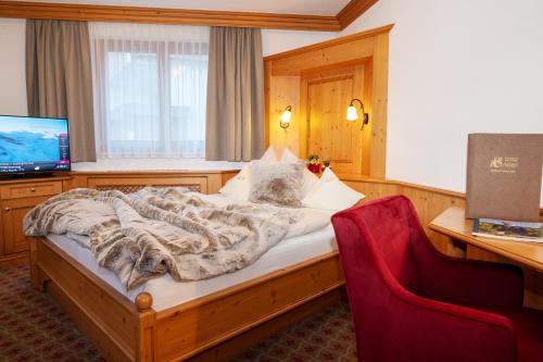 TV a/nebo společenská místnost v ubytování Hotel Sonne Ischgl